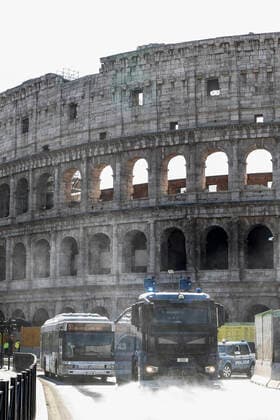 Coronavirus emergency in Rome Police hydrants sanitize the streets of Rome, in the picture: the cleaning operations at the Colosseum and Fori Imperiali Copyright: xBEAUTIFULxSPORTS A.xGiannettix