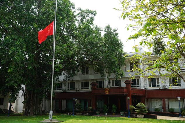 (200404) -- VIENTIANE, April 4, 2020 -- A Chinese national flag flies at half-mast to mourn for martyrs who died in the fight against the novel coronavirus disease (COVID-19) outbreak and compatriots who died of the disease at the Chinese Embassy to Laos in Vientiane, Laos, April 4, 2020. (Chinese Embassy to Laos Handout via Xinhua) LAOS-VIENTIANE-COVID-19-CHINESE EMBASSY-NATIONAL FLAG-HALF-MAST ZhangxJianhua 