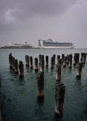 AUSTRALIA CORONAVIRUS COVID-19, Storm clouds hover over Port Melbourne harbour where the Spirit Of Tasmania Ferry and the Golden Princess Cruise Ship remained docked due to the coronavuris (COVID-19) pandemic in Melbourne, Sunday, April 5, 2020. ( NO ARCHIVING, EDITORIAL USE ONLY, NO USE IN BOOKS WITHOUT CONSENT MELBOURNE VIC AUSTRALIA  Copyright: xMICHAELxDODGEx 20200405001461860379