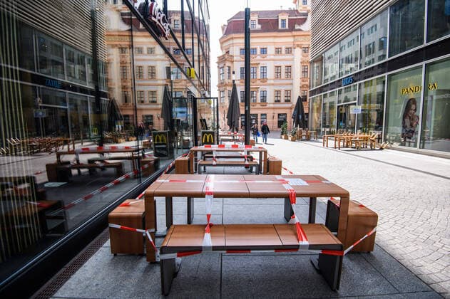 (200405) -- LEIPZIG, April 5, 2020 -- Sealed tables and chairs are seen outside a McDonald s restaurant in Leipzig, eastern Germany, April 4, 2020. More than 89,300 COVID-19 cases and at least 1,250 deaths have been registered as of Saturday afternoon across Germany, according to evaluations of the German Press Agency (DPA) which took into account the latest figures from all federal states. (Photo by Xinhua) GERMANY-LEIPZIG-COVID-19-CASES KevinxVoigt 