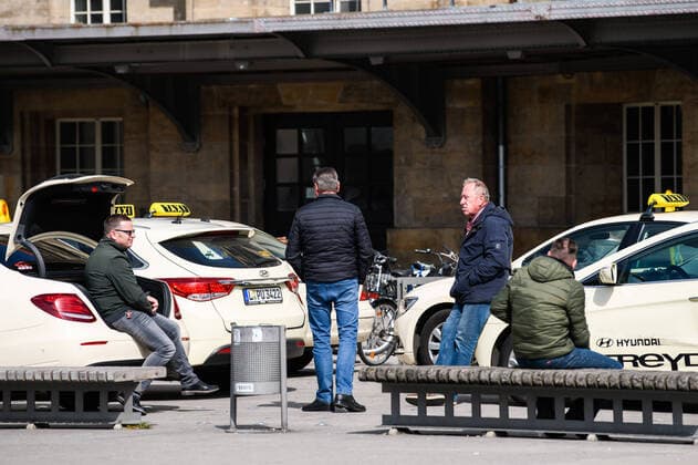 (200405) -- LEIPZIG, April 5, 2020 -- Taxi drivers wait for passengers outside the main train station of Leipzig, eastern Germany, April 4, 2020. More than 89,300 COVID-19 cases and at least 1,250 deaths have been registered as of Saturday afternoon across Germany, according to evaluations of the German Press Agency (DPA) which took into account the latest figures from all federal states. (Photo by Xinhua) GERMANY-LEIPZIG-COVID-19-CASES KevinxVoigt 