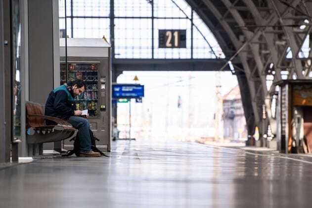 (200405) -- LEIPZIG, April 5, 2020 -- A passenger waits for a train at an empty platform at the main train station of Leipzig, eastern Germany, April 4, 2020. More than 89,300 COVID-19 cases and at least 1,250 deaths have been registered as of Saturday afternoon across Germany, according to evaluations of the German Press Agency (DPA) which took into account the latest figures from all federal states. (Photo by Xinhua) GERMANY-LEIPZIG-COVID-19-CASES KevinxVoigt 