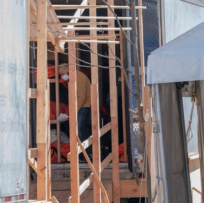Coronavirus pandemic in NYC as seen on April 4 Bodies of deceased patients in orange bags seen in makeshift refrigirated morgue set outside of Wyckoff Heights Medical Center in Brooklyn New York New York United States Copyright: LevxRadin