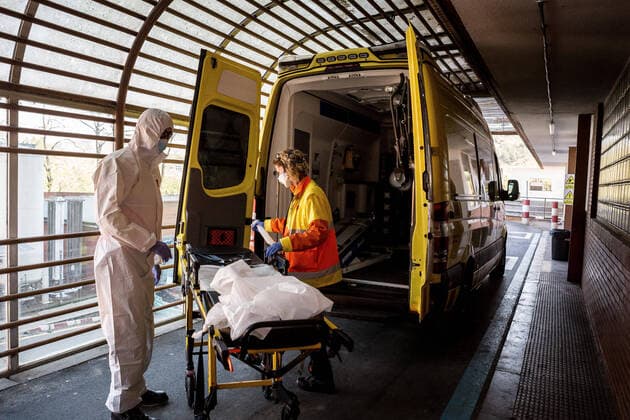 April 4, 2020, Girona, Spain: A worker from the emergency health service disinfects a stretcher after transferring a possible case of covid-19..The emergency health services are forced to comply with specific protocols during the transfers of patients with possible cases of covid-19. At the end of the service they disinfect and throw the personal protective equipment in G-II bags to avoid contagions. Girona Spain - ZUMAs197 20200404_zaa_s197_141 Copyright: xMartixNavarrox