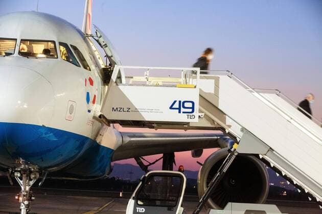 PXL_Flight from Amsterdam 04.04.2020., Franjo Tudjman Airport Zagreb, Zagreb, Croatia - The second extraordinary Croatia Airlines flight from Amsterdam arrived tonight in Zagreb with passengers who, in coordination with the Croatian government, have returned to Croatia from European countries. POOL