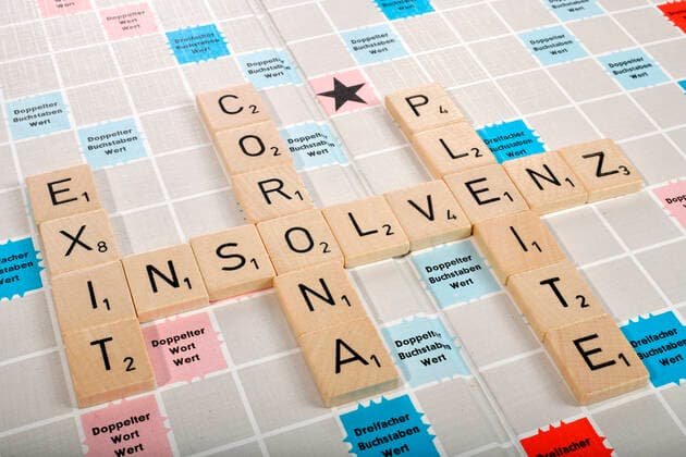 Buchstabenspiel, Symbolbild, Buchstaben bilden die Worte Insolvenz, Pleite, Exit und Corona, Corona-Krise, Deutschland Coronavirus