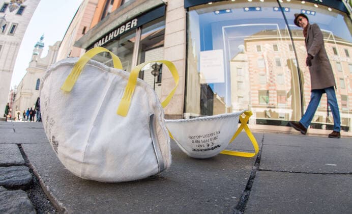 April 1, 2020, Munich, Bavaria, Germany: Discarded 3M protective masks are now a common sight, such as these at Munich s Marienplatz. The German authorities claim Trump personally confiscated a shipment of masks in Bangkok that were alloted by 3M for Germany. Munich Germany - ZUMAb160 20200401_zbp_b160_059 Copyright: xSachellexBabbarx
