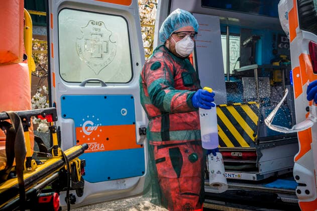Milan. Green Cross volunteers and health workers intervene with the 118 emergency calls on the cases of COVID19 coronavirus preparation and transport to hospital. In the photo the sanctification of the ambulance that is carried out after each intervention (Carlo Cozzoli Fotogramma, Milan - 2020-04-05) p.s. la foto e utilizzabile nel rispetto del contesto in cui e stata scattata, e senza intento diffamatorio del decoro delle persone rappresentate  Copyright: xCarloxCozzolix xFOTOGRAMMAx