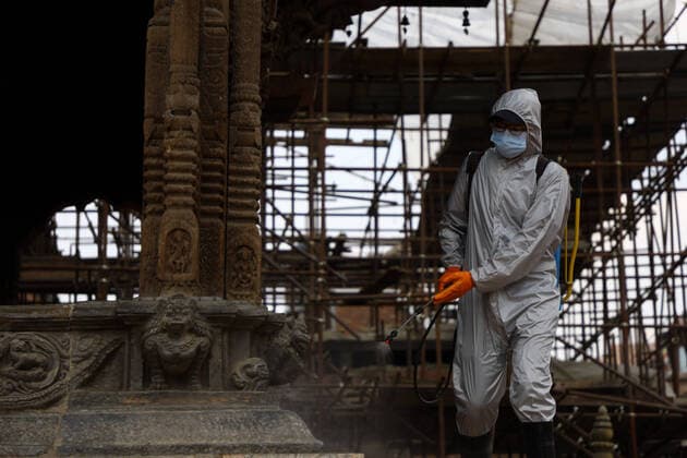 Lockdown in Nepal due to COVID-19 A Nepalese volunteer sprays disinfectants at Patan Durbar Square, a UNESCO World Heritage Site during the nationwide lockdown in Lalitpur, Nepal on Sunday, April 05, 2020. The government of Nepal has decided to impose a nationwide lockdown to prevent the spread of Coronovirus (COVID-19) outbreak. Bagmati Nepal Copyright: SubashxShrestha