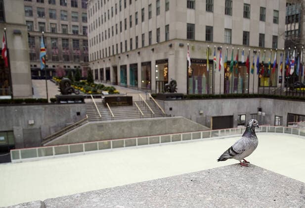 Rockefeller Center is empty of pedestrian traffic on Palm Sunday In New York City on Sunday, April 5, 2020. Cardinal Timothy Dolan today held a virtual Palm Sunday mass from St. Patrick s Cathedral. Coronavirus cases in the U.S. rose to over 300,000 and the number of deaths rose to more than 8,000 Globally the death toll has been reported at more than 65,000.  NYP20200405106 JOHNxANGELILLO