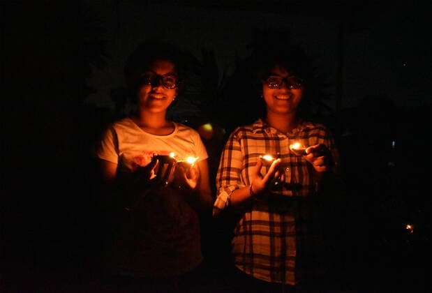 India: A light of hope from the darkness PM Narendra Modi wants to bring our Country in the light from the darkness of the Silent-Killer Covid-19 . For that reason, he requests to all Indian citizens to switch off the lights of our houses and lit the candles or to use torches or flashlight of the cell phones from our balcony for 9 min on 5th April, Sunday at 9 pm. He also warns us to maintain the Social Distancing while lighting up. Kolkata West Bengal India Copyright: SudiptaxDas