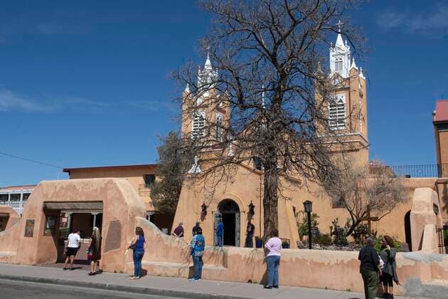 April 5, 2020, Albuquerque, New Mexico, USA: After Palm Sunday services broadcast to parishioners palm fronds were handed out to parishioners at San Felipe de Neri Roman Catholic Church in Old Town. Albuquerque USA - ZUMAlbuq 20200405_mda_k150_204 Copyright: xRickxKozakx
