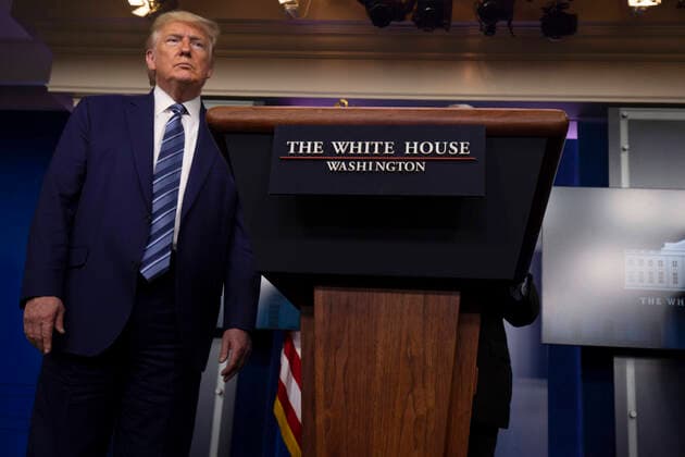 April 5, 2020, Washington, District of Columbia, USA: United States President Donald J. Trump listens as Director of the National Institute of Allergy and Infectious Diseases at the National Institutes of Health Dr. Anthony Fauci speaks at the coronavirus briefing at the White House Washington, D.C., U.S., on Sunday, April 5, 2020. The next two weeks will be crucial in the United States fight against the coronavirus, warn health officials, who are urging Americans to continue practicing social-distancing measures Washington USA - ZUMAs152 20200405_zaa_s152_039 Copyright: xTasosxKatopodisx