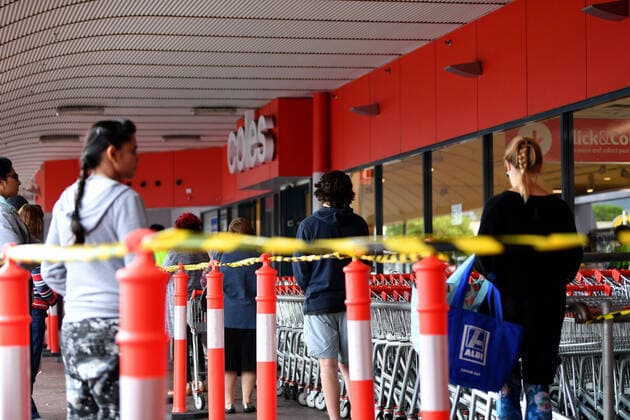 AUSTRALIA CORONAVIRUS COVID-19, Shoppers are seen waiting outside a Coles supermarket at Firle in Adelaide, Monday, April 6, 2020. The Australian Government has announced even tighter restrictions around social gatherings, and boosted stimulus spending, in attempts to fight off the coronavirus and it s affects on the economy. ( NO ARCHIVING, EDITORIAL USE ONLY, NO USE IN BOOKS WITHOUT CONSENT ADELAIDE SA AUSTRALIA  Copyright: xDAVIDxMARIUZx 20200406001461983095