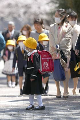 New coronavirus Pupils are pictured after attending an entrance ceremony at an elementary school in Nagoya, central Japan, on April 6, 2020, the first day of the new school year. Elementary and junior high schools had been closed in Japan since early March due to the coronavirus outbreak. 