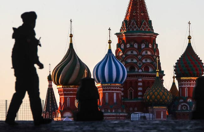 MOSCOW, RUSSIA - APRIL 6, 2020: A police officer patrols a deserted Red Square during the pandemic of the novel coronavirus (COVID-19). As of 6 April 2020, Russia has reported more than 6,300 confirmed cases of the novel coronavirus, with more than 4,400 confirmed cases in Moscow. Since 30 March 2020, Moscow has been on lockdown in connection with the pandemic. The Russian government announced a paid period off work for employed people and school holidays, which is expcted to last till the end of April. Valery Sharifulin TASS  TS0D4855