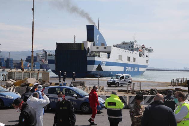 The Catania Grimaldi ferry that brought at home 105 Italians citizens evaquated from Tuinisia arrives in the harbor as paramedics, military and police wait for check the passengers. In Italy the lockdown still continue Government Decree declaring all of Italy a protected area to combat covid-19 - coronavirus infection, closing schools, public offices and shops.  Copyright: xCarloxHermannx xIPAx xKontrolabx