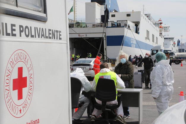 Paramedics check passengers disembarked from the Catania Grimaldi ferry that brought to home 105 Italians citizens evaquated from Tuinisia.In Italy the lockdown still continue Government Decree declaring all of Italy a protected area to combat covid-19 - coronavirus infection, closing schools, public offices and shops.  Copyright: xCarloxHermannx xIPAx xKontrolabx