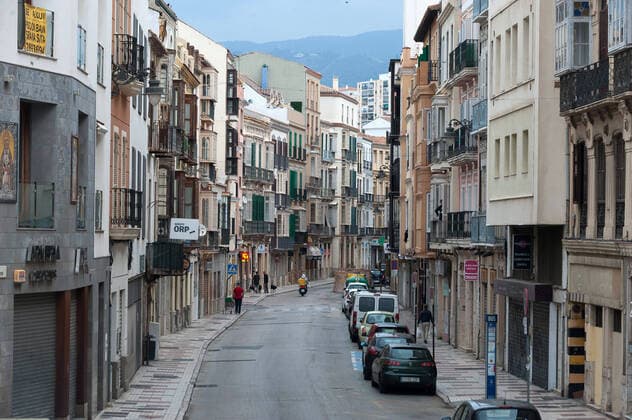 April 6, 2020, Malaga, Spain: A view of an empty street on a Holy Monday in downtown Malaga..The traditional Easter celebration has been cancelled in Spain. Believers live an unusual Holy Week in their homes, for that reason many people decorate their balconies or place decorative statues of Christ in their shops and stores. After the alarm state and lockdown in the country by COVID-19 coronavirus all people are enclosed in their homes following the confinement decreed by the Spanish government and which will be extended for more 15 days until 26 April. Malaga Spain - ZUMAs197 20200406_zaa_s197_038 Copyright: xJesusxMeridax