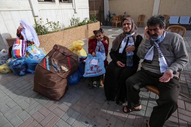 April 6, 2020, Khan Younis, Gaza Strip, Palestinian Territory: Palestinians who were quarantined leave the quarantine centers, after the end of the quarantine period in the center of Muscat in Khan Younis in the southern of Gaza strip, April 6, 2020 Khan Younis Palestinian Territory - ZUMAap3_ 20200406_zaf_ap3_088 Copyright: xAshrafxAmrax