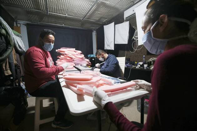 (200406) -- ALGIERS, April 6, 2020 -- Algerian young people make face shields which they want to donate to local hospitals, in Algiers, Algeria, April 6, 2020. Algeria on Monday reported 103 new cases of COVID-19 and 21 new deaths, bringing the total number of confirmed cases to 1,423 and the death toll to 173. ALGERIA-ALGIERS-SELF-MADE FACE SHIELDS-DONATION huangxling 