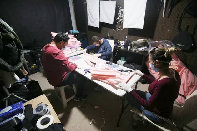 (200406) -- ALGIERS, April 6, 2020 -- Algerian young people make face shields which they want to donate to local hospitals, in Algiers, Algeria, April 6, 2020. Algeria on Monday reported 103 new cases of COVID-19 and 21 new deaths, bringing the total number of confirmed cases to 1,423 and the death toll to 173. ALGERIA-ALGIERS-SELF-MADE FACE SHIELDS-DONATION huangxling 