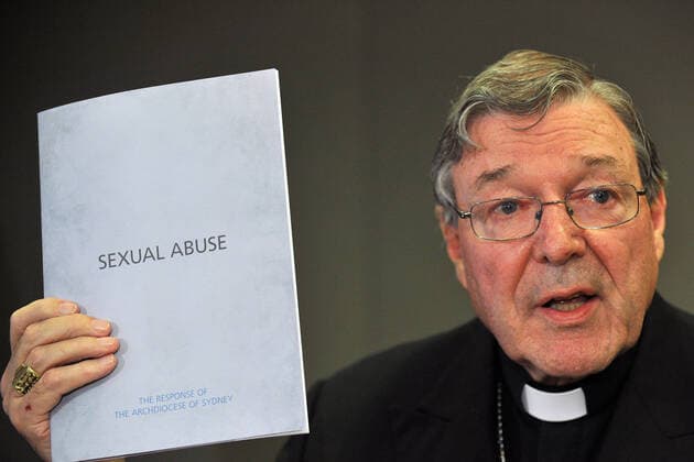 CARDINAL PELL CATHOLIC SEX ABUSE PRESSER, Cardinal George Pell holds up a folder outlining the archiocese response to sexual abuse at a press conference in Sydney on Tuesday, Nov. 13, 2012. Australia s most senior Catholic believes the royal commission will uncover the truth about the child sex abuse scandal. ( NO ARCHIVING, EDITORIAL USE ONLY, NO USE IN BOOKS WITHOUT CONSENT SYDNEY NSW AUSTRALIA  Copyright: xPAULxMILLERx 20121113000595661915