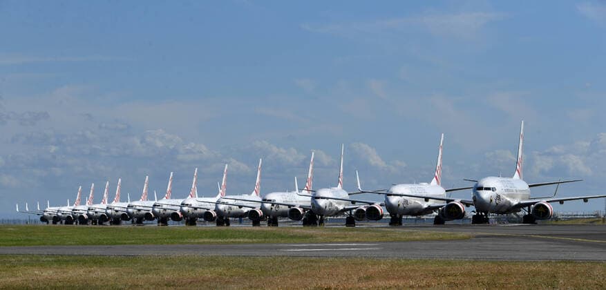 AUSTRALIA CORONAVIRUS COVID-19, Grounded Virgin Australia aircraft are seen parked at Brisbane Airport in Brisbane, Tuesday, April 7, 2020. Brisbane Airport Corporation (BAC) is working with airlines by accommodating up to 100 grounded aircraft free of charge in response to government-mandated travel restrictions that have grounded a significant proportion of Australia s airline fleet because of the Coronavirus (COVID-19). ( NO ARCHIVING, EDITORIAL USE ONLY, NO USE IN BOOKS WITHOUT CONSENT BRISBANE QLD AUSTRALIA  Copyright: xDARRENxENGLANDx 20200407001462126772