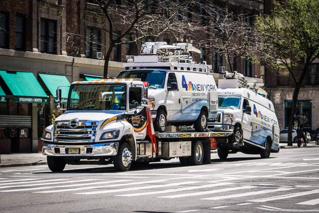 NYC: Essential workers amid COVID-19 Amid the Covid-19 pandemic essential workers like firemen, healthcare workers, EMS, bus drivers, food deliveryman, crossing guard, mailman all on the job. New York City New York United States Copyright: StevexSanchez
