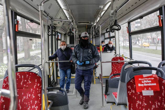 (200407) -- ISTANBUL, April 7, 2020 (Xinhua) -- A policeman checks a bus which people older than 65 are forbidden to take due to the spread of COVID-19 in Istanbul, Turkey, April 6, 2020. In Turkey, the second hardest-hit country in the Middle East, 3,148 new COVID-19 cases were reported on Monday, bringing the total number to 30,217, and the death toll surged to 649. (Xinhua) TURKEY-COVID-19 CASES