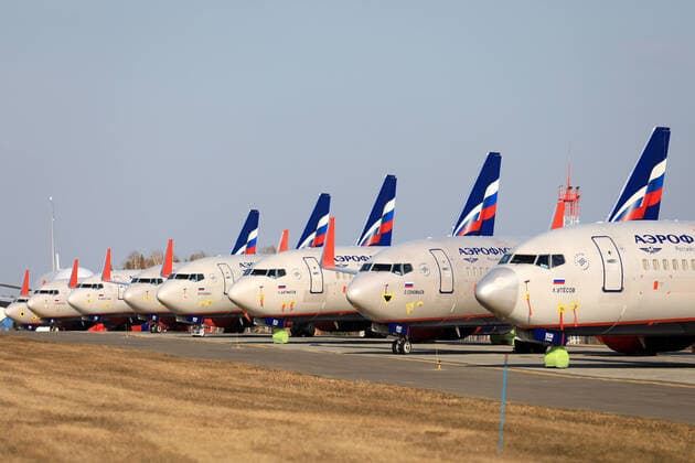 KRASNOYARSK TERRITORY, RUSSIA - APRIL 7, 2020: Aeroflot passenger planes at Krasnoyarsk International Airport. Russia has halted all international flights since March 27, 2020, amid the ongoing COVID-19 coronavirus pandemic, except for repatriation flights. Since April 4, every repatriation flight has to be pre-arranged; Russian citizens arrive at Sheremetyevo Airport only, with the number of passengers per day limited to 500. The passenger traffic in Russian airports has decreased by 89% compared to April 2019. Andrei Samsonov TASS  TS0D4ABA