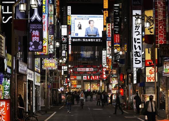 New coronavirus A Large screen in Tokyo s Shinjuku area shows Japanese Prime Minister Shinzo Abe speaking at a press conference in Tokyo on April 7, 2020, after declaring a state of emergency in the capital and other big cities in response to a surge in coronavirus infections. 