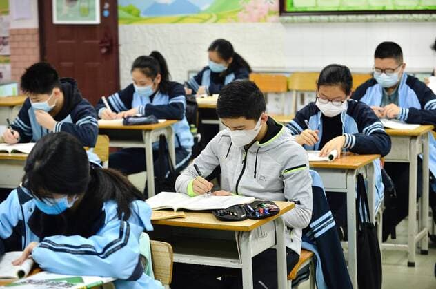 (200407) -- NANNING, April 7, 2020 -- Students study in the morning at the No. 2 High School in Nanning, south China s Guangxi Zhuang Autonomous Region, April 7, 2020. Students in the final year of senior and junior high schools returned to school on Tuesday in Guangxi. ) CHINA-GUANGXI-NANNING-SENIOR HIGH SCHOOL STUDENTS-RETURNING TO SCHOOL (CN) CuixBowen 