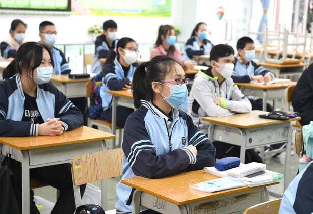 (200407) -- NANNING, April 7, 2020 -- Students attend a class at the No. 2 High School in Nanning, south China s Guangxi Zhuang Autonomous Region, April 7, 2020. Students in the final year of senior and junior high schools returned to school on Tuesday in Guangxi. ) CHINA-GUANGXI-NANNING-SENIOR HIGH SCHOOL STUDENTS-RETURNING TO SCHOOL (CN) ZhouxHua 