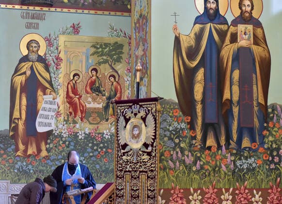 STAVROPOL TERRITORY, RUSSIA - APRIL 7, 2020: A Russian Orthodox priest confesses a believer in the Cathedral of Christ the Saviour Healing An Infirm Man At The Pool of Bethesda, on the feast day of the Annunciation, in the city of Pyatigorsk. Anton Podgaiko TASS  TS0D4B80