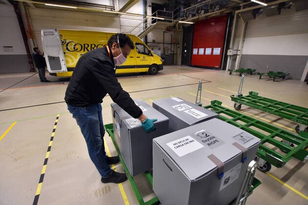 April 7, 2020, Martorell, Barcelona, Spain: A worker loading OxyGEN respirators into a van..Spanish automobile company, SEAT has shifted a team of 150 workers from manufacturing cars to making respirators that help COVID-19 patients, reusing mechanical parts like the windshield wiper motor. The respirator is called OxyGEN. Martorell Spain - ZUMAs197 20200407_zaa_s197_089 Copyright: xRamonxCostax