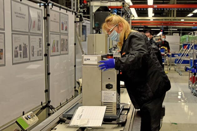 April 7, 2020, Martorell, Barcelona, Spain: A female assembly operator protected with a surgical mask and gloves during the manufacture of OxyGENs..Spanish automobile company, SEAT has shifted a team of 150 workers from manufacturing cars to making respirators that help COVID-19 patients, reusing mechanical parts like the windshield wiper motor. The respirator is called OxyGEN. Martorell Spain - ZUMAs197 20200407_zaa_s197_092 Copyright: xRamonxCostax