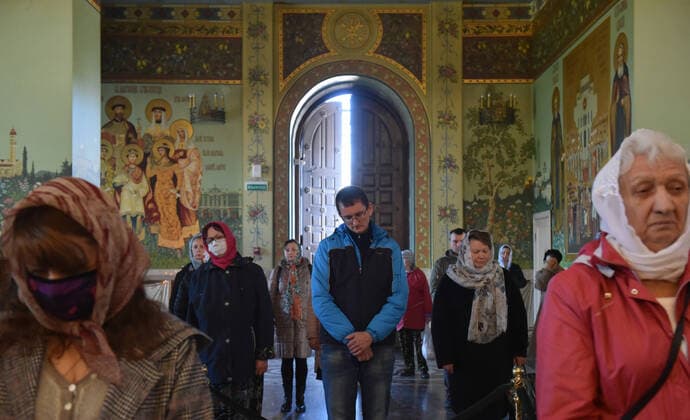 STAVROPOL TERRITORY, RUSSIA - APRIL 7, 2020: Russian Orthodox believers attend a service in the Cathedral of Christ the Saviour Healing An Infirm Man At The Pool of Bethesda, on the feast day of the Annunciation, in the city of Pyatigorsk. Anton Podgaiko TASS  TS0D4B85
