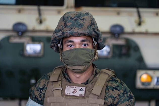 April 7, 2020, Camp Foster, Okinawa, Japan: U.S. Marine Corps LCpl. Michael Ottinger wears a homemade face covering for protection against the COVID-19, coronavirus pandemic at Camp Foster April 7, 2020 in Okinawa, Japan. The CDC has recommended all military personnel to wear a face covering while outside their residence to stop the spread. Camp Foster Japan - ZUMAp138 20200407_zaa_p138_002 Copyright: xDavidxEsparza UsxMarinex