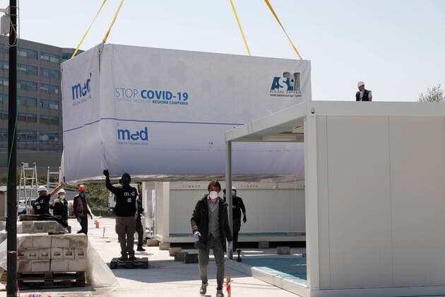 April 7, 2020, Naples, CAMPANIA, ITALY: 07 04 2020 Naples, 50 trucks containing medical equipment have arrived from Veneto for the preparation of the Ospedale del Mare in Ponticelli which will soon become a Covid center. All the material was purchased from the Campania Region. Naples ITALY - ZUMAs236 20200407_zap_s236_003 Copyright: xFabioxSassox