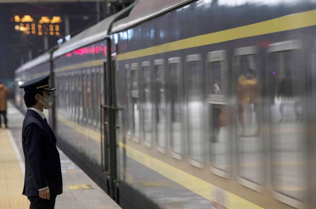 (200408) -- WUHAN, April 8, 2020 -- Train K81 pulls off Wuchang Railway Station in Wuhan, central China s Hubei Province, April 8, 2020. Wuhan, the megacity in central China, started lifting outbound travel restrictions from Wednesday after almost 11 weeks of lockdown to stem the spread of COVID-19. ) CHINA-HUBEI-WUHAN-OUTBOUND TRAVEL RESTRICTIONS-LIFT (CN) FeixMaohua 