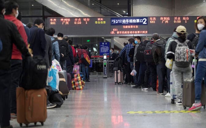 (200408) -- WUHAN, April 8, 2020 -- Passengers wait in line for train K81 at Wuchang Railway Station in Wuhan, central China s Hubei Province, April 8, 2020. Wuhan, the megacity in central China, started lifting outbound travel restrictions from Wednesday after almost 11 weeks of lockdown to stem the spread of COVID-19. ) CHINA-HUBEI-WUHAN-OUTBOUND TRAVEL RESTRICTIONS-LIFT (CN) FeixMaohua 