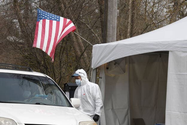 April 7, 2020, North Bay, Wisconsin, USA: The Wisconsin presidential primary and state election proceeds Tuesday April 7, 2020 after a day of legal wrangling. Some of the poll workers in the Village of North Bay wore extensive protective clothing. North Bay USA - ZUMAh154 20200407_znp_h154_037 Copyright: xMarkxHertzbergx