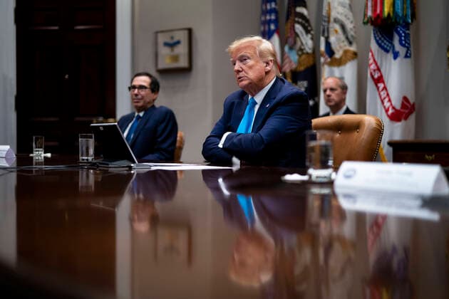 April 7, 2020, Washington, District of Columbia, USA: United States President Donald J. Trump makes remarks with United States Secretary of the Treasury Steven T. Mnuchin looking as he participates in a Small Business Relief Update, Tuesday, April 7, 2020. President Donald Trump announced in March that companies affected by the coronavirus will be given $50 billion more in low-interest loans federally guaranteed by the Small Business Administration Washington USA - ZUMAs152 20200407_zaa_s152_009 Copyright: xDougxMillsx