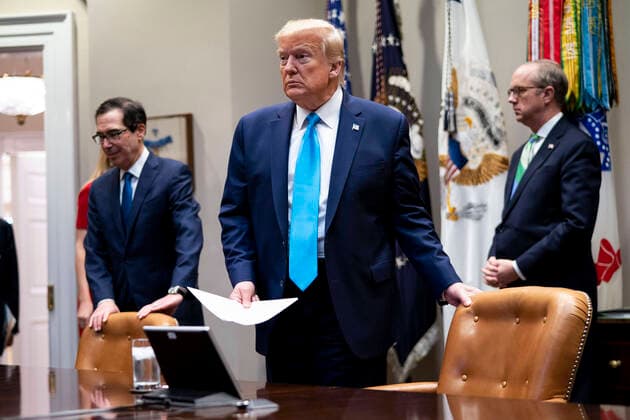 April 7, 2020, Washington, District of Columbia, USA: United States President Donald J. Trump makes remarks with United States Secretary of the Treasury Steven T. Mnuchin looking as he participates in a Small Business Relief Update, Tuesday, April 7, 2020. President Donald Trump announced in March that companies affected by the coronavirus will be given $50 billion more in low-interest loans federally guaranteed by the Small Business Administration Washington USA - ZUMAs152 20200407_zaa_s152_014 Copyright: xDougxMillsx