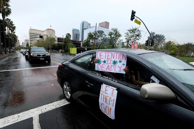 April 7, 2020, Los Angeles, California, U.S: Amid fears of the coronavirus pandemic, protesters drive their cars and trucks in a noisy procession in otherwise mostly silent, empty streets in downtown Los Angeles, Tuesday, April 7, 2020. The demonstration is designed to persuade county leaders to release the incarcerated from detention centers into homes where they can be monitored away from jails that have become breeding grounds for the virus. Los Angeles U.S. - ZUMAc68_ 20200407_zaf_c68_001 Copyright: xRingoxChiux