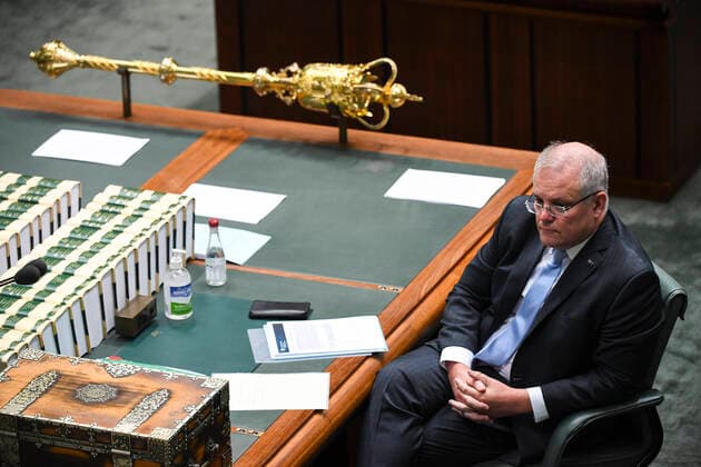 CORONAVIRUS LEGISLATION PARLIAMENT, Australian Prime Minister Scott Morrison reacts during a parliamentary sitting under rules of social distancing in the House of Representatives at Parliament House in Canberra, Wednesday, April 8, 2020. ( NO ARCHIVING, EDITORIAL USE ONLY, NO USE IN BOOKS WITHOUT CONSENT CANBERRA ACT AUSTRALIA  Copyright: xLUKASxCOCHx 20200408001462292623