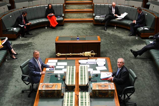 QUESTION TIME, Australian Prime Minister Scott Morrison (right) and Australian Opposition Leader Anthony Albanese react during House of Representatives Question Time at Parliament House in Canberra, Wednesday, April 8, 2020. ( NO ARCHIVING, EDITORIAL USE ONLY, NO USE IN BOOKS WITHOUT CONSENT CANBERRA ACT AUSTRALIA  Copyright: xLUKASxCOCHx 20200408001462315857