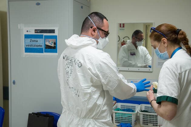 Rome: Dressing of nurses in a COVID-19 Hospital Dressing procedures for nurses in the clean area of pavilion D of the San Filippo Neri hospital in Rome, used as a Covid hospital Roma RM Italy Copyright: MatteoxNardone