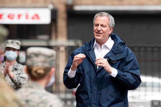 April 8, 2020, Bronx, NY, U.S: April 8, 2020 - Bronx, NY, United States: New York City Mayor BILL DE BLASIO (D) welcoming members of the United States Air Force who have been deployed to Lincoln Hospital. The mayor is seen here in a courtyard of Lincoln Hospital with U.S. Air Force personnel. Bronx U.S. - ZUMAb161 20200408_zap_b161_003 Copyright: xMichaelxBrochsteinx